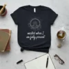 Dark t-shirt with white text "wasted when I am fully present" and a meditating figure graphic
