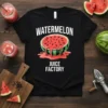 Watermelon Juice Factory text design on a black t-shirt featuring a dripping watermelon graphic