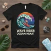 Black t-shirt with "Wave Rider Ocean Heart" text and a graphic of a surfer on a wave, with a sunset