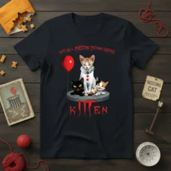WE ALL MEOW DOWN HERE KITTEN text with three cats and a red balloon on a black t-shirt design