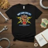 Black t-shirt with vintage "We Can Do It!" slogan, raised fist, gear, and lightning bolts, featuring "War Production Co-Ordinating Committee"