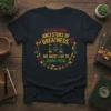 Black t-shirt with "We Come From Ancestors Of Greatness; We Must Live To Honor Them" in yellow, red, and green