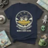 T-shirt with "WE COME IN PEACE (PROMISE) MEOW & BARK ALIENS" text featuring a cat and dog in a UFO