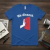 Blue t-shirt with white text "We dissent." and a graphic of a hand breaking through a red wall