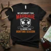 Black t-shirt with "We Interrupt This Marriage To Bring You Hunting Season" text, featuring deer antlers and crossed rifles graphic