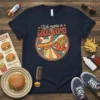 Retro t-shirt design with text "We Make a GOOD COMB" featuring a UFO and anthropomorphic french fries