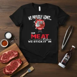 Black t-shirt with the quote "We Rub Our Meat Before We Stick It In" and cartoon salt and pepper shakers