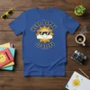 Wear Happy Be Happy t-shirt with a smiling sun wearing sunglasses, black text arc