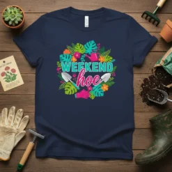 T-shirt with "WEEKEND hoe" text surrounded by colorful flowers, leaves, gardening tools, and pink gloves