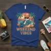 Weekend Vibes t-shirt with a cartoon fox relaxing in a hammock on a beach with palm trees and a sunset
