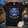 Cheshire Cat design with "We're All Mad Here" text, featuring intricate purple and teal patterns