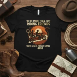 T-shirt design with text "We're More Than Just Riding Friends We're Like A Really Small Gang" featuring a motorcycle and