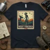 West Virginia Alien Stamp T-Shirt featuring an alien, satellite dish, and UFOs in a postage stamp design