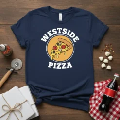 Westside Pizza graphic t-shirt design with a slice of pizza inside a yellow circle and white text "WESTSIDE PIZZA"