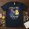 What The Duck is it? funny quote t-shirt with purple and yellow detective ducks examining a magnifying glass