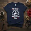 T-shirt with "WHEN I NEEDED A Hand I FOUND YOUR Paw" text, a paw print in a hand graphic, and