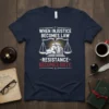 T-shirt with "When Injustice Becomes Law Resistance Becomes Duty" quote and scales of justice graphic