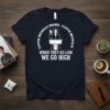 T-shirt design with "When They Go Low We Go High" quote and Michelle Obama graphic, white text and silhouette on