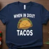 Navy blue t-shirt with white text "When In Dout Tacos" and a cute smiling taco graphic