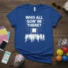 Blue t-shirt with white text "WHO ALL GON' BE THERE?" above a graphic of people entering an open doorway with
