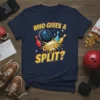 Navy blue t-shirt with yellow and red text "WHO GIVES A CRASH! SPLIT?" and graphics of a bowling ball and