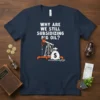T-shirt with the text "WHY ARE WE STILL SUBSIDIZING PIG OIL?" above an oil pump jack and a money bag