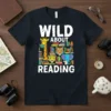 Wild About Reading t-shirt with colorful books and cartoon zoo animals including a giraffe, tiger, leopard, and elephant