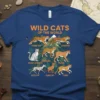 T-shirt design featuring "Wild Cats of the World" text and illustrations of various wild cat species including cheetah, jaguar, snow