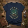 Wild Hearts Untamed Spirits quote with a green and gold wolf illustration on a navy t-shirt, evoking nature and freedom