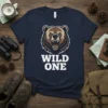 Graphic t-shirt featuring a roaring bear head above the bold white text "WILD ONE"