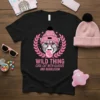 Cheetah wearing pink beanie and glasses blowing bubblegum, text WILD THING COOL CAT WITH GLASSES AND BUBBLEGUM