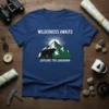 Wilderness Awaits Explore The Unknown t-shirt design with a bear walking past mountains under a sunburst graphic