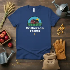 Wilkerson Farms t-shirt featuring a red barn and rolling green fields under a sunny sky, with text "Wilkerson Farms" and