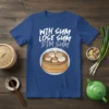 Win Sum Lose Sum Dim Sum T-Shirt featuring a steaming bamboo basket of dumplings, white text on blue tee