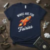 Navy t-shirt with white text "WINGS ARE FOR Fairies" and an orange rocket ship graphic
