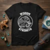 Black t-shirt with white text "WISDOM STRENGTH" encircling a decorative elephant graphic
