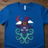 Witch cat with octopus tentacles, moon, and stars graphic on a blue t-shirt, Witch Cat Octopus Halloween theme