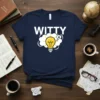 Navy blue t-shirt with "WITTY" text and a glowing yellow light bulb inside a thought bubble graphic