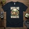 Woodland Wonders t-shirt design with a frog, mushrooms, and forest trees, featuring the text "WOODLAND WONDERS" in bold font