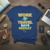 Blue t-shirt with yellow and teal text reading "WORK TRAVEL SAVE REPEAT" and a graphic of the Earth