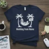 Working from Home t-shirt design with a sloth in a hammock between palm trees, using a laptop