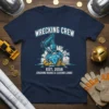 Navy t-shirt with "Wrecking Crew Est. 2016 Crushing Rishes & Closing Loans" text and a graphic of a claw machine