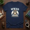 WWAD acronym t-shirt featuring a wise owl wearing glasses and sitting on an open book, with gears in the background