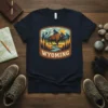 Wyoming Bison T-Shirt with mountain landscape and river graphic design on quality cotton t-shirt fabric