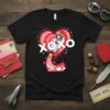 XOXO Penguin Rocket Valentine's Day T-Shirt design featuring a penguin in a spacesuit launching from a rocket with hearts and