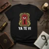 Black t-shirt with "Ya Te Vi" text below a red eye inside a keyhole graphic with gold ornate frame