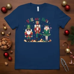 Nutcracker Christmas t-shirt with "Y'all are Nuts" text and festive characters in green and red outfits