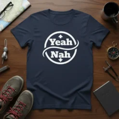 Navy blue t-shirt with white "Yeah Nah" text inside a circular design with arrows, featuring Aussie slang