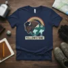 Yellowstone National Park t-shirt featuring a bison, mountains, geysers, and a rainbow graphic with the word "Yellowstone"