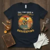 Yes I Do Have A Retirement Plan I Plan on Beekeeping T-Shirt featuring a cartoon bee reading a book in